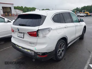 2019 BMW X1 xDrive28i with VIN WBXHT3C54K3H35641, listed as a IAAI auction lot 42241894 with 100,989 mi miles and . Bid and sale history available at DreamBid. Image 4.