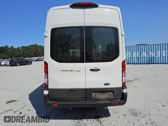 2023 Ford Transit Cargo z VIN 1FTBR3X82PKA82517, wystawiony jako Copart lot #75703934 z przebiegiem 34 304 mil mil oraz Czysty tytuł • Clean title. Historia ofert i sprzedaży dostępna na DreamBid. Obrazek 6.