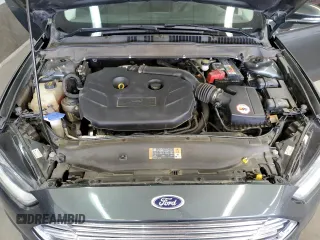 2015 Ford Fusion SE z VIN 3FA6P0H98FR295646, wystawiony jako Copart lot #57055105 z przebiegiem 121 515 mil mil oraz Szkoda całkowita • Salvage title. Historia ofert i sprzedaży dostępna na DreamBid. Obrazek 11.