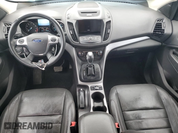 2016 Ford Escape SE z VIN 1FMCU0G91GUC59990, wystawiony jako Copart lot #56956395 z przebiegiem 112 706 mil mil oraz Szkoda całkowita • Salvage title. Historia ofert i sprzedaży dostępna na DreamBid. Obrazek 8.