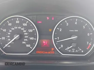 2009 BMW 1 Series 128i with VIN WBAUL73509VJ75662, listed as a IAAI auction lot 42639936 with 96,542 mi miles and . Bid and sale history available at DreamBid. Image 7.