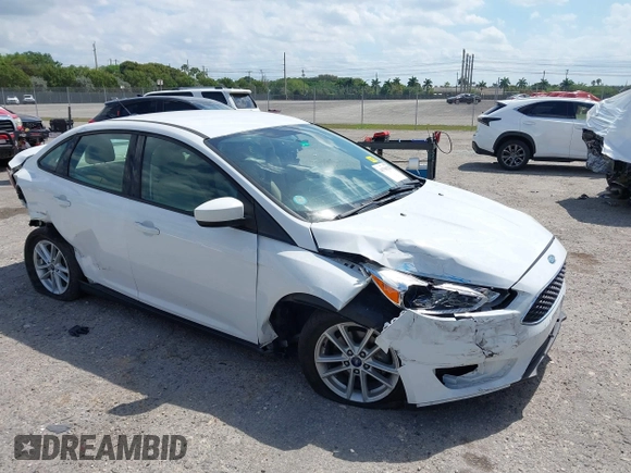 2018 Ford Focus SE with VIN 1FADP3F29JL213008, listed as a IAAI auction lot 41790224 with 85,056 mi miles and . Bid and sale history available at DreamBid. Image 1.
