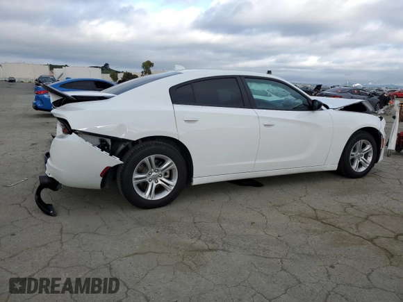 2023 Dodge Charger SXT with VIN 2C3CDXBG5PH703978, listed as a Copart auction lot 50657745 with 7,198 mi miles and Salvage Title. Bid and sale history available at carsss.com. Image 3.