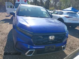 2023 Honda CR-V Sport Touring with VIN 5J6RS6H96PL001826, listed as a IAAI auction lot 42098381 with 13,813 mi miles and . Bid and sale history available at DreamBid. Image 6.