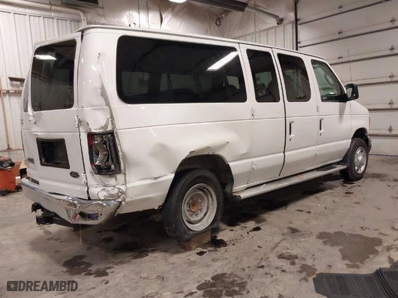 2007 Ford Econoline Wagon XL with VIN 1FMNE11L87DA58507, listed as a IAAI auction lot 41128969 with 143,383 mi miles. Bid and sale history available at carsss.com. Image 4.