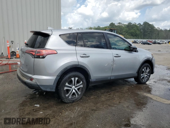 2017 Toyota RAV4 LE with VIN 2T3ZFREV3HW387441, listed as a Copart auction lot 51742245 with 104,823 mi miles and Salvage Title. Bid and sale history available at DreamBid. Image 3.