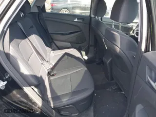 2019 Hyundai Tucson Value with VIN KM8J3CA41KU066384, listed as a IAAI auction lot 41524315 with 52,903 mi miles. Bid and sale history available at carsss.com. Image 8.