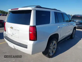 2018 Chevrolet Tahoe LT with VIN 1GNSCBKC7JR101043, listed as a IAAI auction lot 42192481 with 152,831 mi miles and . Bid and sale history available at DreamBid. Image 4.