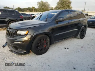 2012 Jeep Grand Cherokee SRT8 with VIN 1C4RJFDJ2CC329621, listed as a Copart auction lot 86772154 with 236,800 mi miles and Salvage Title. Bid and sale history available at carsss.com. Image 1.