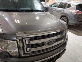 2014 Ford F-150 XL with VIN 1FTFW1EF5EFB71651, listed as a IAAI auction lot 42051456 with 143,945 mi miles and . Bid and sale history available at DreamBid. Image 12.