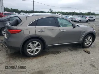 2014 Infiniti QX70 with VIN JN8CS1MW7EM412867, listed as a Copart auction lot 60054195 with 148,064 mi miles and Salvage title. Bid and sale history available at DreamBid. Image 3.