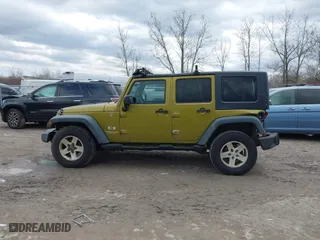 2008 Jeep Wrangler Unlimited X with VIN 1J4GA39158L529523, listed as a IAAI auction lot 41979992 with 304,641 mi miles. Bid and sale history available at carsss.com. Image 14.