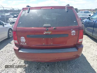 2007 Jeep Grand Cherokee Laredo with VIN 1J8GR48K57C618529, listed as a IAAI auction lot 42139566 with 174,559 mi miles. Bid and sale history available at carsss.com. Image 6.