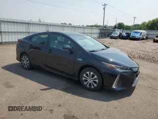 2021 Toyota Prius LE with VIN JTDKAMFP8M3170547, listed as a Copart auction lot 60262615 with 56,156 mi miles and Salvage title. Bid and sale history available at DreamBid. Image 4.
