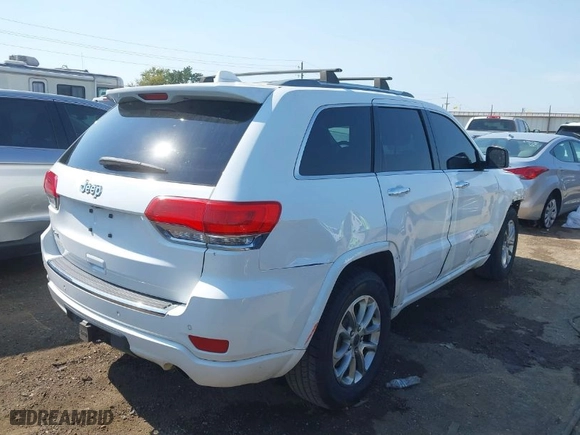 2014 Jeep Grand Cherokee Overland with VIN 1C4RJFCTXEC128443, listed as a IAAI auction lot 40512681 with 126,379 mi miles. Bid and sale history available at carsss.com. Image 4.