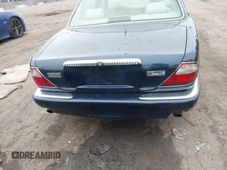 1998 Jaguar XJ Vanden Plas with VIN SAJKX6246WC832202, listed as a IAAI auction lot 41218807 with 96,589 mi miles and . Bid and sale history available at DreamBid. Image 16.
