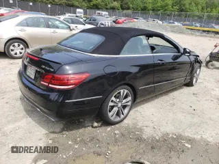 2015 Mercedes-Benz E 400 with VIN WDDKK6FFXFF295735, listed as a Copart auction lot 52134483 with 36,835 mi miles and Salvage title. Bid and sale history available at DreamBid. Image 3.