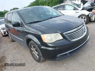 2012 Chrysler Town & Country Touring z VIN 2C4RC1BG5CR299610, wystawiony jako IAAI lot #42450382 z przebiegiem 181 574 mil mil oraz . Historia ofert i sprzedaży dostępna na DreamBid. Obrazek 1.