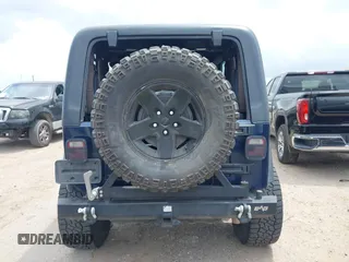 2005 Jeep Wrangler X with VIN 1J4FA39S15P320367, listed as a IAAI auction lot 42114102 with 142,132 mi miles and . Bid and sale history available at DreamBid. Image 16.