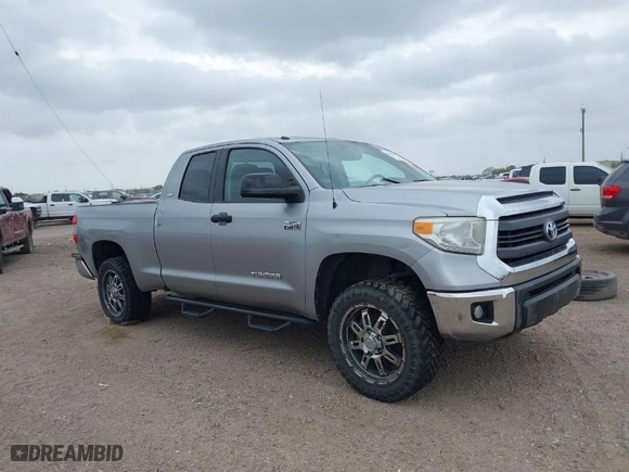 2014 Toyota Tundra 4WD Truck SR with VIN 5TFUW5F12EX379093, listed as a IAAI auction lot 41730439 with 133,409 mi miles. Bid and sale history available at carsss.com. Image 13.
