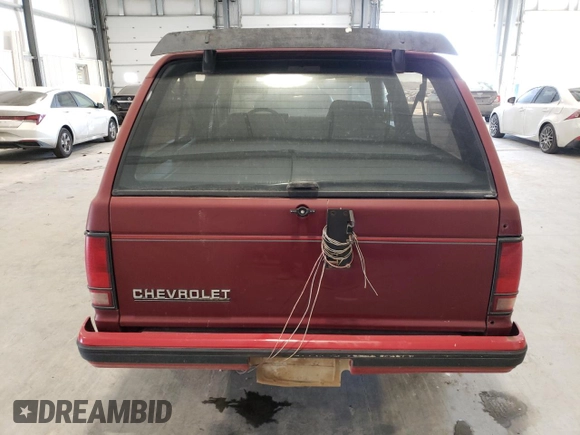 1990 Chevrolet Blazer z VIN 1GNCT18Z3L0102885, wystawiony jako Copart lot #89399875 z przebiegiem 176 063 mil mil oraz Szkoda całkowita • Salvage title. Historia ofert i sprzedaży dostępna na DreamBid. Obrazek 6.