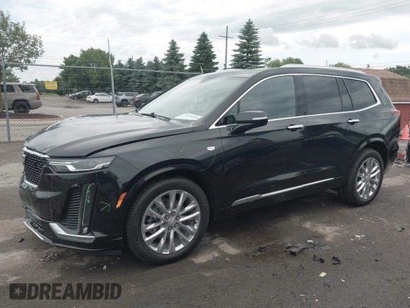 2022 Cadillac XT6 Premium Luxury with VIN 1GYKPDRS6NZ156380, listed as a IAAI auction lot 42542067 with 42,563 mi miles and . Bid and sale history available at DreamBid. Image 2.