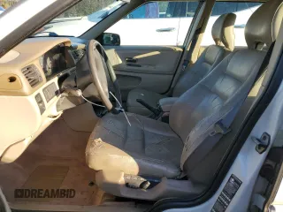 1998 Volvo S70 z VIN YV1LS5538W1465730, wystawiony jako Copart lot #84165414 z przebiegiem 182 073 mil mil oraz Szkody całkowita. Historia ofert i sprzedaży dostępna na DreamBid. Obrazek 7.