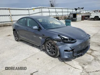 2023 Tesla Model 3 с VIN 5YJ3E1EAXPF678336, выставлен на аукционе Copart как лот 52509135 с пробегом Не указан миль и Списание • Salvage title. История ставок и продаж доступна на DreamBid. Изображение 4.