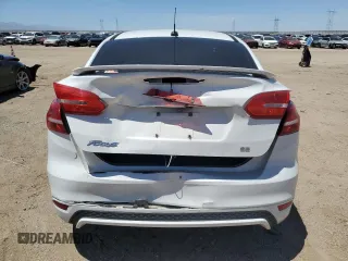 2016 Ford Focus SE с VIN 1FADP3F28GL344469, выставлен на аукционе Copart как лот 57490255 с пробегом 120 658 миль миль и Списание • Salvage title. История ставок и продаж доступна на DreamBid. Изображение 6.