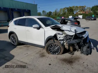 2020 Mazda CX-5 Touring with VIN JM3KFACM0L0770254, listed as a Copart auction lot 71066824 with 0 mi miles and Salvage Title. Bid and sale history available at carsss.com. Image 4.