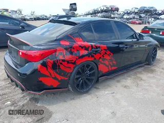 2015 Infiniti Q50 Premium z VIN JN1BV7AR8FM398319, wystawiony jako IAAI lot #42170789 z przebiegiem 86 108 mil mil oraz . Historia ofert i sprzedaży dostępna na DreamBid. Obrazek 4.