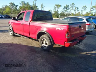 2002 Ford F-150 XL with VIN 1FTRX17232NB82055, listed as a IAAI auction lot 41146311 with 1 mi miles. Bid and sale history available at carsss.com. Image 3.