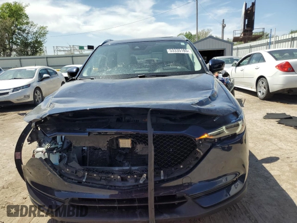 2018 Mazda CX-5 Grand Touring with VIN JM3KFADM7J0377315, listed as a Copart auction lot 53335185 with 68,462 mi miles and Salvage title. Bid and sale history available at DreamBid. Image 5.