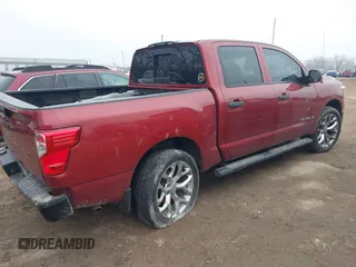 2017 Nissan Titan S with VIN 1N6AA1EJ8HN560496, listed as a IAAI auction lot 41514466 with 122,856 mi miles. Bid and sale history available at carsss.com. Image 4.