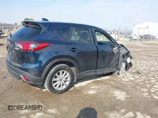 2015 Mazda CX-5 Touring with VIN JM3KE2CY0F0516589, listed as a IAAI auction lot 41707973 with 109,245 mi miles. Bid and sale history available at carsss.com. Image 4.