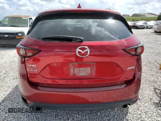 2018 Mazda CX-5 Grand Touring with VIN JM3KFADM7J0399895, listed as a Copart auction lot 47598265 with 0 mi miles and Salvage Title. Bid and sale history available at carsss.com. Image 6.