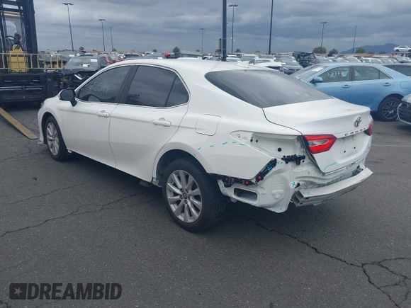 2020 Toyota Camry LE with VIN 4T1C11AK3LU882824, listed as a IAAI auction lot 41765544 with 48,209 mi miles and . Bid and sale history available at carsss.com. Image 3.