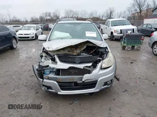 2007 Suzuki SX4 Man Touring Pkg AWD with VIN JS2YB417475102405, listed as a IAAI auction lot 41106931 with 170,315 mi miles. Bid and sale history available at carsss.com. Image 12.