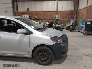 2008 Toyota Yaris with VIN JTDBT903781251568, listed as a IAAI auction lot 42090260 with 264,356 mi miles. Bid and sale history available at carsss.com. Image 12.