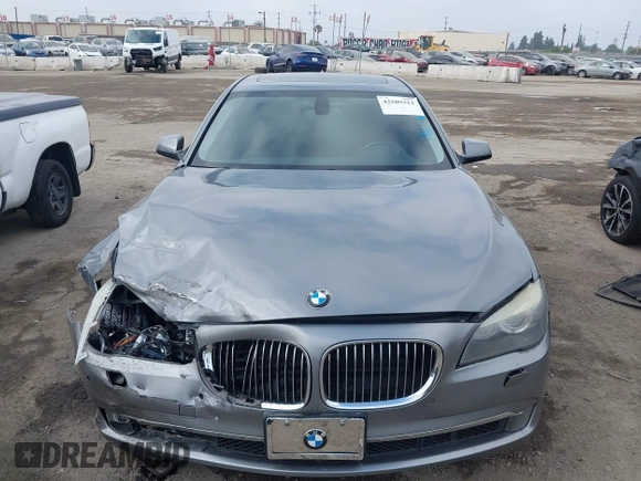 2012 BMW 7 Series 740i with VIN WBAKA4C52CC613676, listed as a IAAI auction lot 42509312 with 113,971 mi miles and . Bid and sale history available at DreamBid. Image 12.