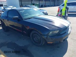 2012 Ford Mustang V6 Premium with VIN 1ZVBP8AMXC5210873, listed as a IAAI auction lot 41944669 with 213,555 mi miles. Bid and sale history available at carsss.com. Image 1.