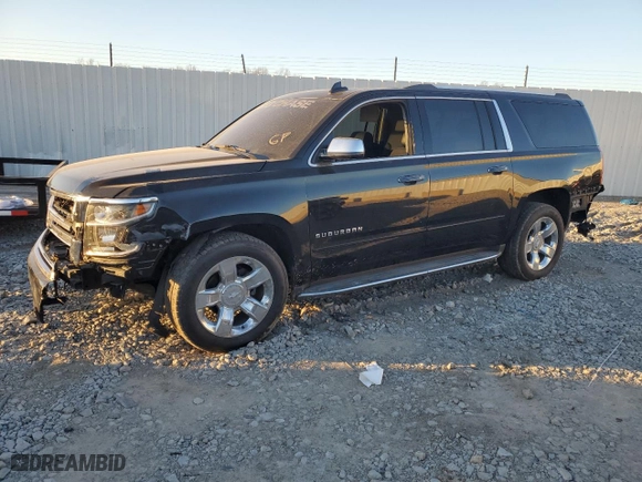 2017 Chevrolet Suburban Premier with VIN 1GNSKJKC5HR303600, listed as a Copart auction lot 83395644 with 124,465 mi miles and Salvage Title. Bid and sale history available at carsss.com. Image 1.