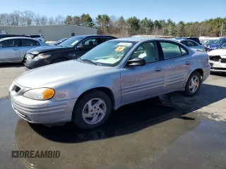 1999 Pontiac Grand Am SE2 with VIN 1G2NE52T4XM714331, listed as a Copart auction lot 52125935 with Not provided miles and Salvage title. Bid and sale history available at DreamBid. Image 1.