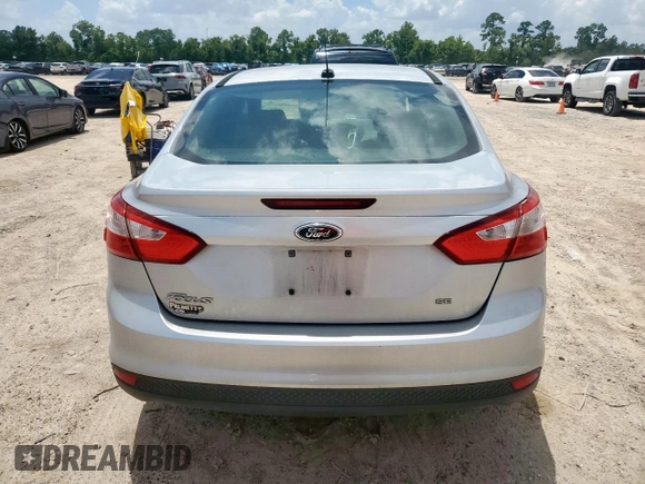2012 Ford Focus SE with VIN 1FAHP3F29CL287498, listed as a Copart auction lot 61476855 with 139,801 mi miles and Salvage title. Bid and sale history available at DreamBid. Image 6.