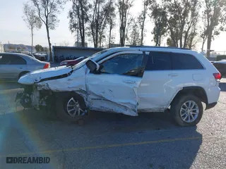 2021 Jeep Grand Cherokee Laredo X with VIN 1C4RJEAG2MC719395, listed as a IAAI auction lot 41338484 with 99,636 mi miles. Bid and sale history available at carsss.com. Image 14.