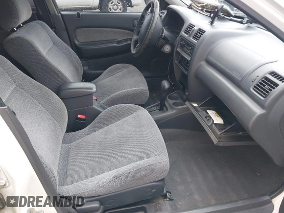 1997 Mazda Protege DX with VIN JM1BC1417V0156858, listed as a IAAI auction lot 42118339 with 187,673 mi miles and . Bid and sale history available at DreamBid. Image 5.