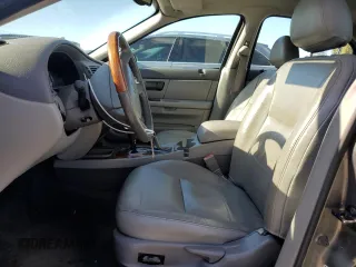 2005 Ford Taurus z VIN 1FAHP59U15A158162, wystawiony jako Copart lot #81109994 z przebiegiem 81 196 mil mil oraz Czysty tytuł • Clean title. Historia ofert i sprzedaży dostępna na DreamBid. Obrazek 7.