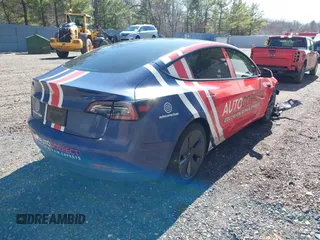 2022 Tesla Model 3 with VIN 5YJ3E1EA5NF168201, listed as a IAAI auction lot 41855273 with 31,393 mi miles and . Bid and sale history available at DreamBid. Image 4.