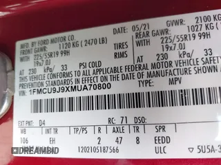 2021 Ford Escape Titanium with VIN 1FMCU9J9XMUA70800, listed as a IAAI auction lot 41717946 with Not Provided miles and . Bid and sale history available at carsss.com. Image 9.