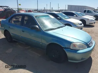 1999 Honda Civic LX z VIN 2HGEJ6678XH571463, wystawiony jako IAAI lot #42248315 z przebiegiem 133 049 mil mil oraz . Historia ofert i sprzedaży dostępna na DreamBid. Obrazek 1.
